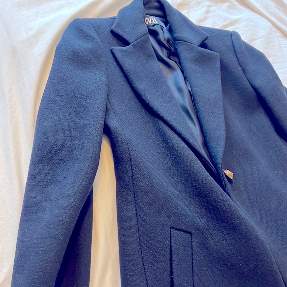 Classic navy blue peacoat. Collared neck,two side pockets. Size (S)Wool blend.